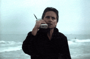 Michael Douglas bellen mobiele telefoon vroeger strand Wall Street