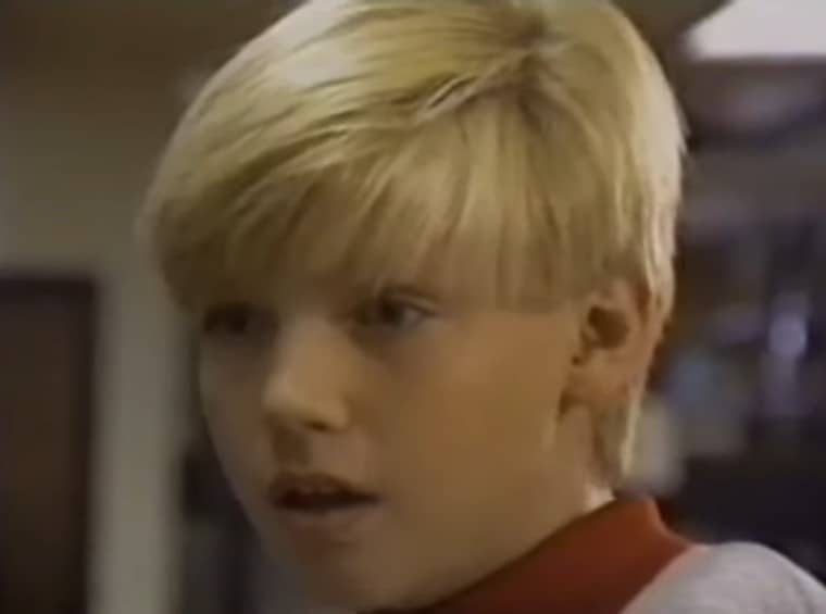 Nick Carter reach for a book